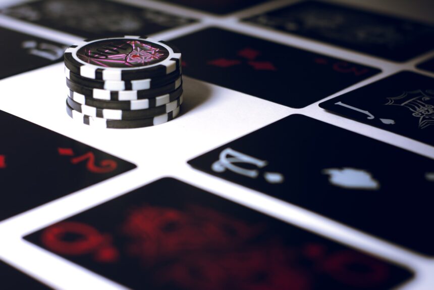 poker chip on white surface