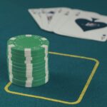 green poker chips on table